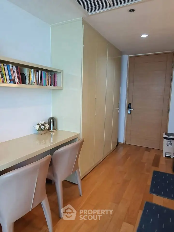 Modern study area with built-in storage and sleek wooden flooring