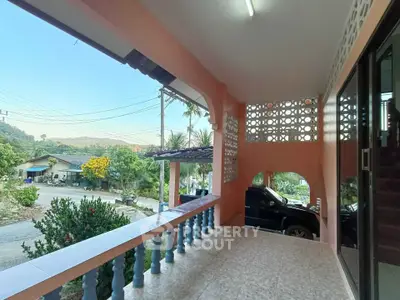 Charming balcony with scenic view and parking space in suburban home