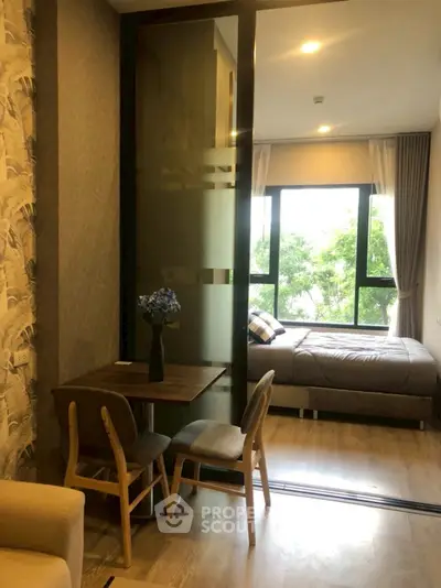 Cozy studio apartment with modern decor and natural light