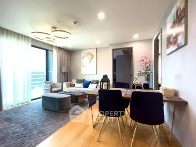 Luxurious modern living room with elegant dining area and large windows