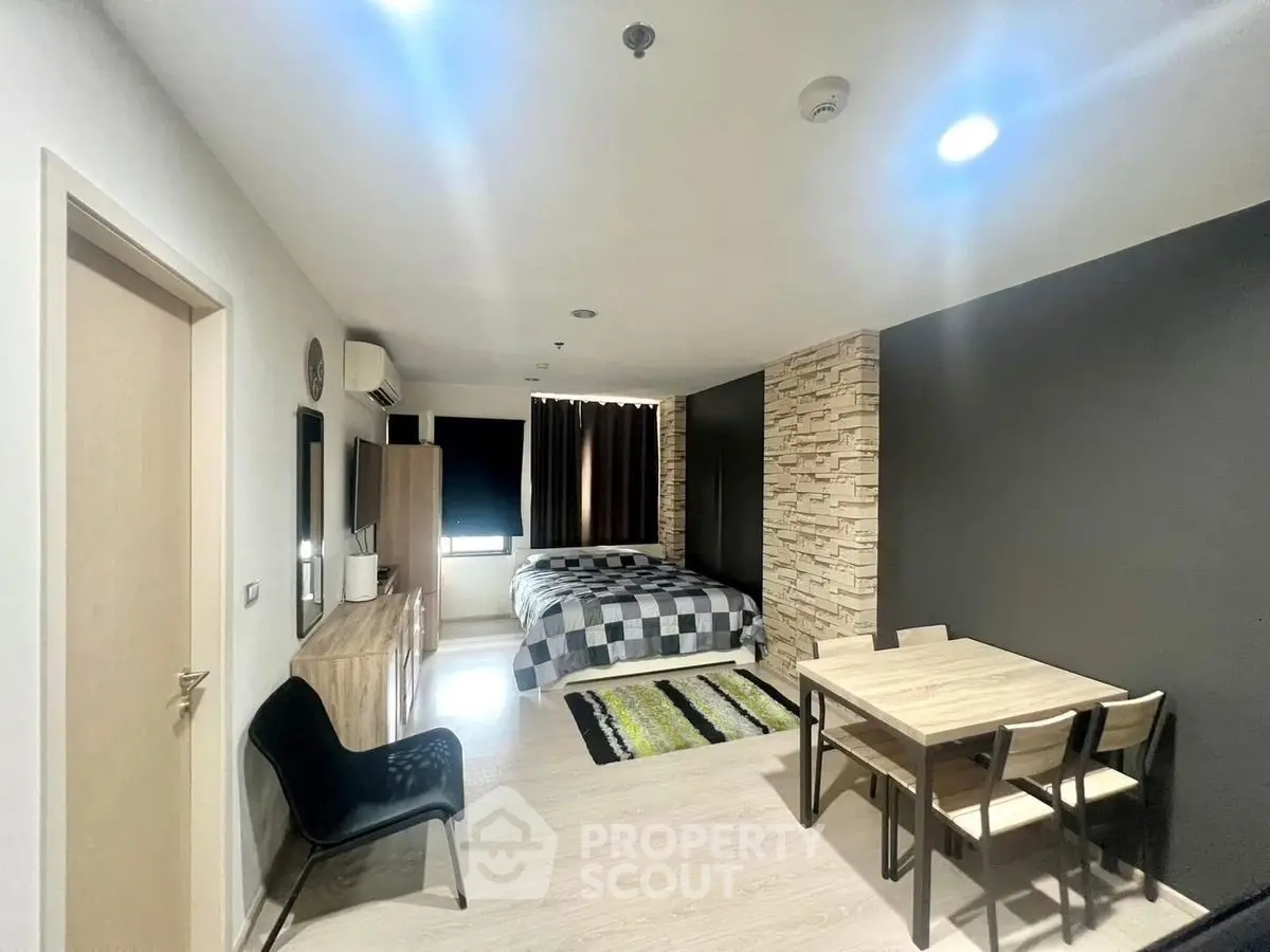 Modern studio apartment with stylish decor and cozy furnishings