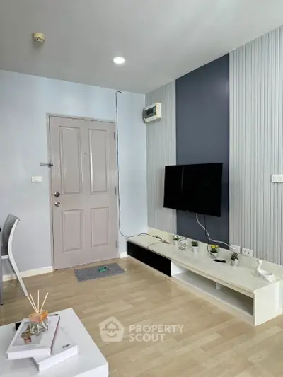 Modern living room with sleek TV setup and stylish decor