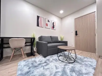 Modern living room with stylish decor and cozy seating area