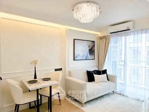 Elegant living room with modern decor and natural light