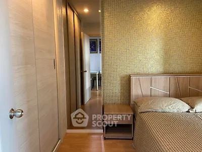 Modern bedroom with stylish wooden furniture and elegant decor