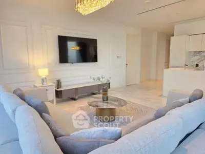 Luxurious living room with elegant decor and modern amenities in a high-end apartment.