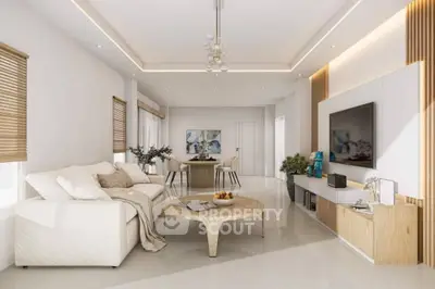 Modern living room with elegant decor and open dining area