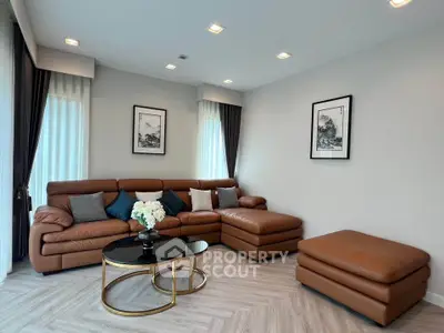 Stylish living room with modern leather sofa and elegant decor