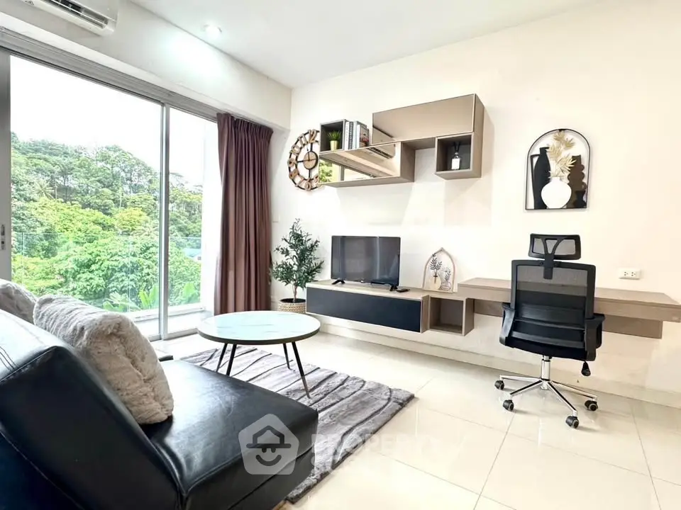 Modern living room with sleek furniture and large window view