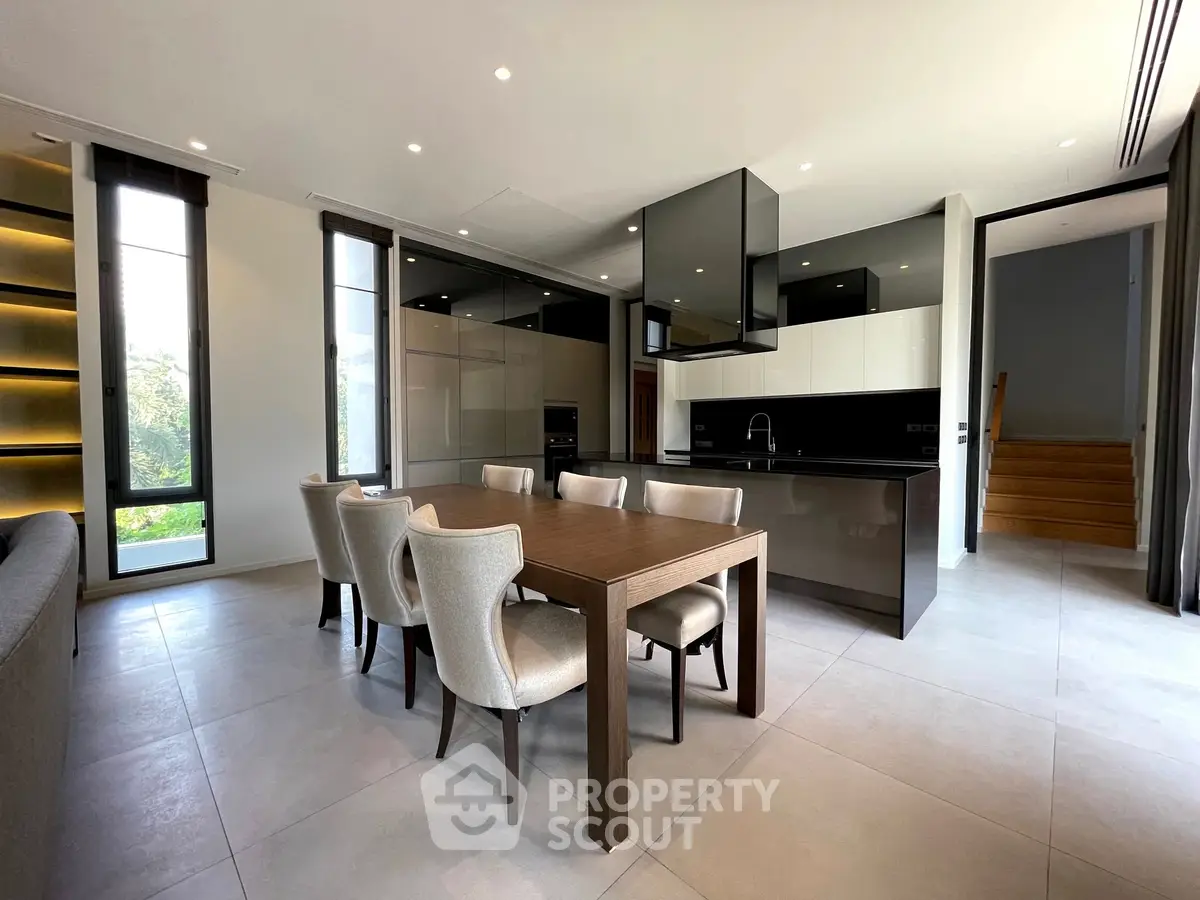 Luxurious modern kitchen with sleek design and spacious dining area