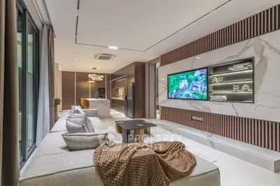 Luxurious modern living room with open kitchen and stylish decor