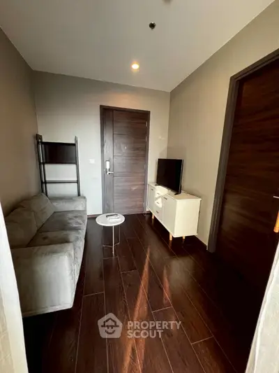 Cozy living room with modern furniture and wooden flooring