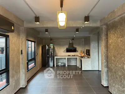 Spacious modern kitchen with open layout and sleek appliances
