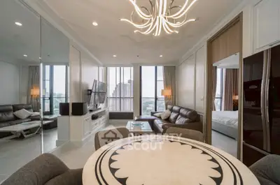 Luxurious modern living room with elegant chandelier and city view