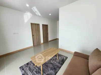 Modern living room with minimalist design and natural light