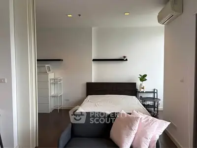 Modern bedroom with minimalist decor and cozy ambiance