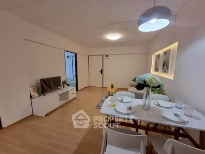 Modern living room with dining area and stylish decor