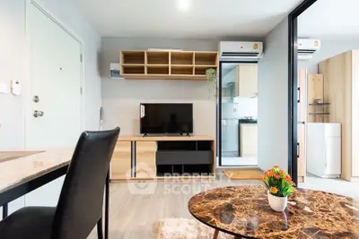 Modern living room with stylish furniture and open kitchen layout