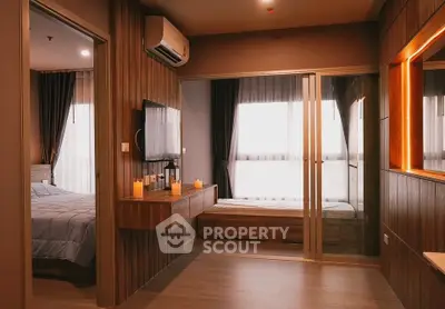 Modern bedroom with stylish decor and ambient lighting in a cozy apartment.