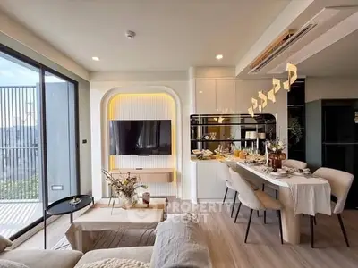 Modern living room with elegant dining area and stylish decor