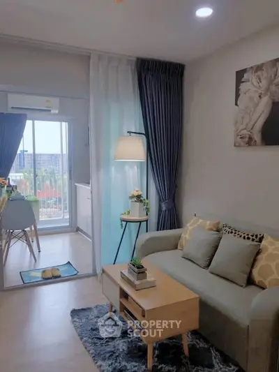 Cozy living room with modern decor and balcony view in stylish apartment