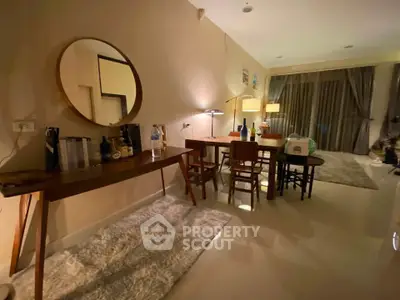 Stylish living room with modern furniture and ambient lighting, perfect for cozy evenings.