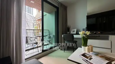 Modern living room with balcony access in urban apartment