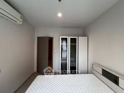 Modern bedroom with minimalist design and air conditioning