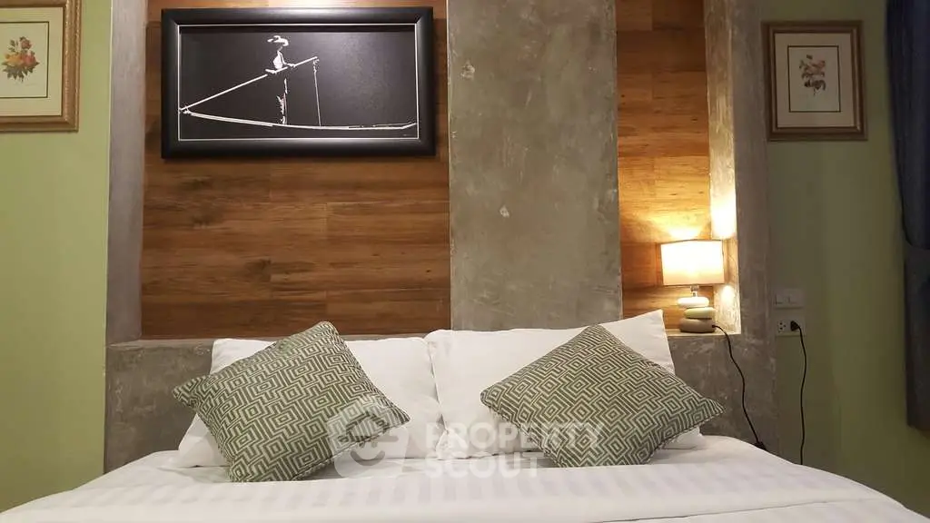 Cozy bedroom with stylish decor and ambient lighting