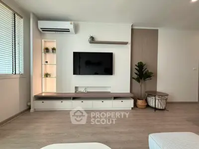 Modern living room with sleek TV setup and stylish decor