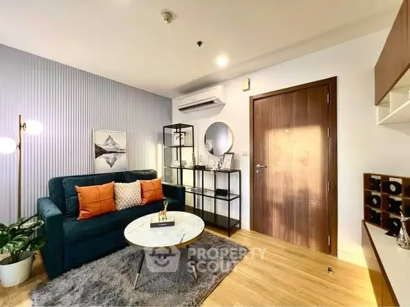 Modern living room with stylish decor and cozy seating area.