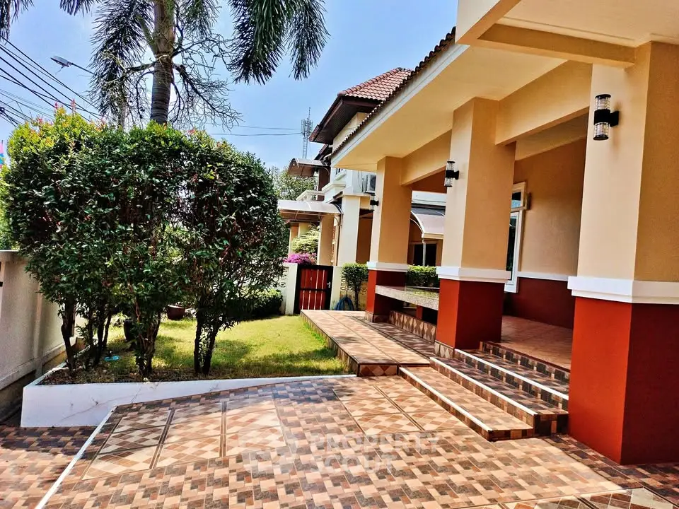 Charming suburban home with lush garden and inviting entrance