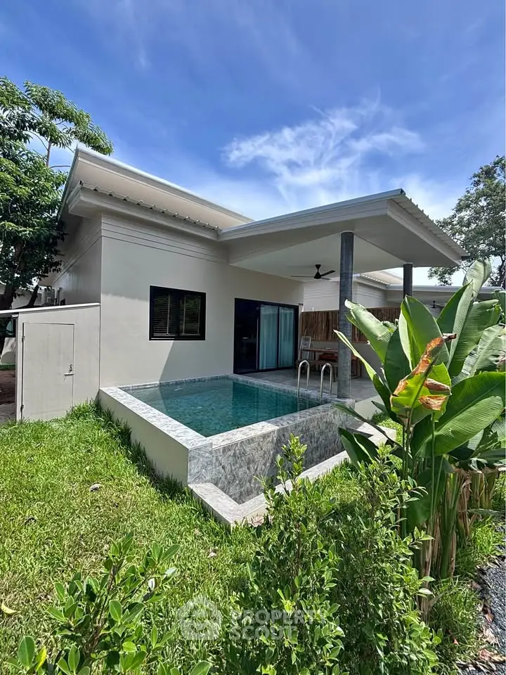 Modern villa with private pool and lush garden, perfect for luxury living.