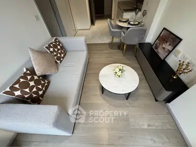 Modern living room with stylish decor and cozy seating area