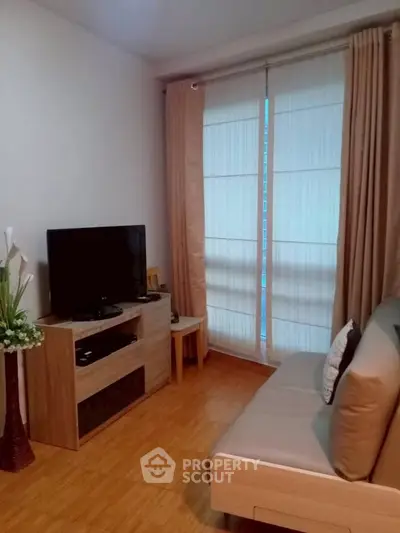 Cozy living room with modern decor and natural light