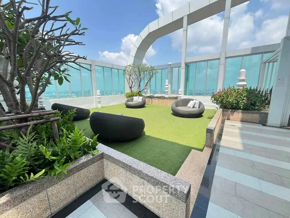 Luxurious rooftop garden with modern seating and panoramic views
