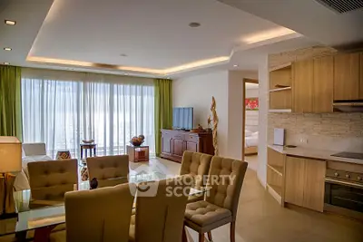 Luxurious open-plan living room with ocean view, elegant dining area, and modern kitchen in a high-end apartment.
