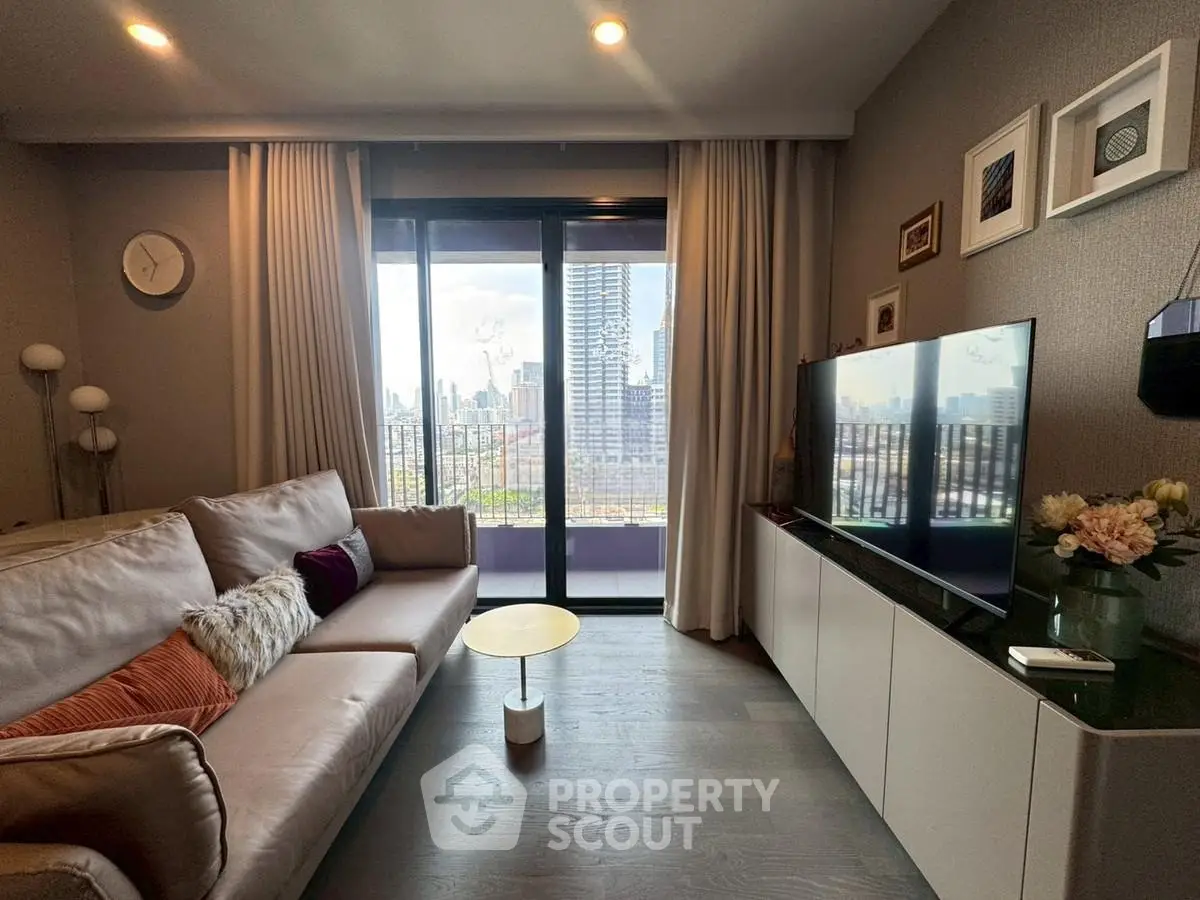 Modern living room with city view, stylish decor, and cozy seating area.