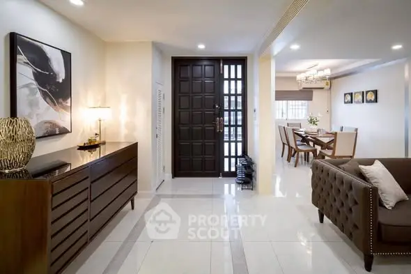 Spacious modern living room with elegant decor and dining area