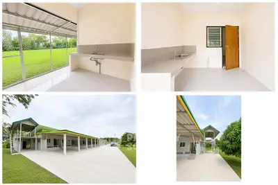 Modern single-story building with spacious outdoor area and sleek interior design.