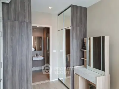Modern bedroom with ensuite bathroom and stylish vanity area
