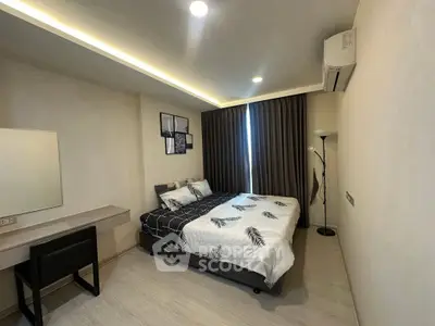 Modern bedroom with stylish decor, cozy bed, and ambient lighting, perfect for relaxation and comfort.