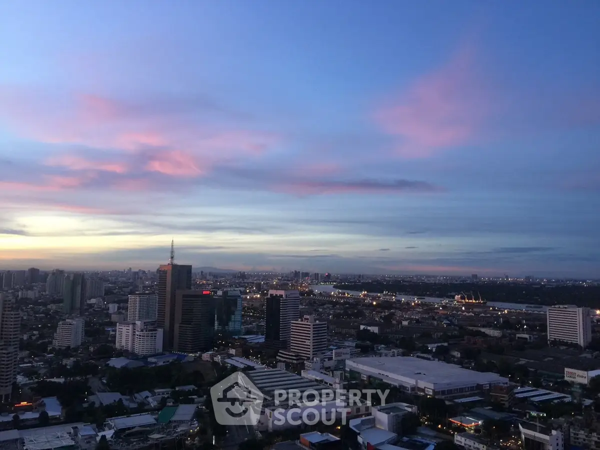Stunning cityscape view at dusk with vibrant sky over urban skyline.