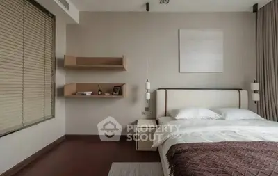 Modern bedroom with minimalist decor and cozy ambiance
