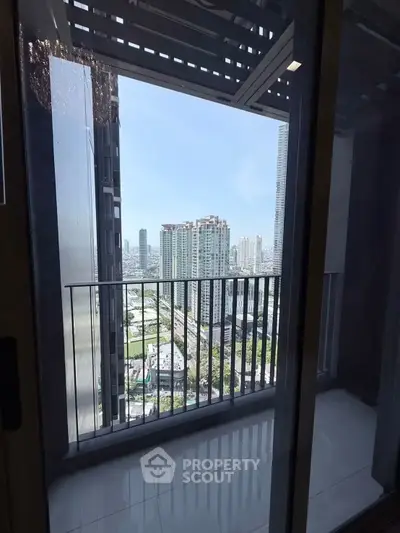 Stunning cityscape view from a modern high-rise balcony, perfect for urban living enthusiasts.