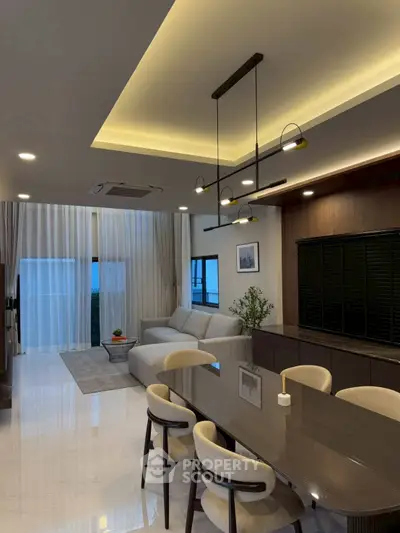 Luxurious modern living room with elegant dining area and ambient lighting