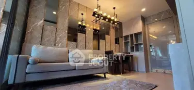 Luxurious modern living room with elegant lighting and plush sofa in a stylish apartment.