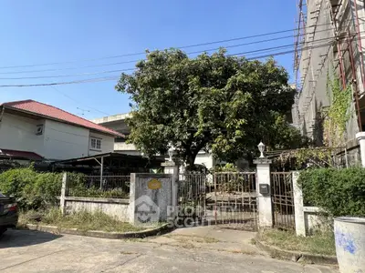 Charming residential property with lush garden and spacious driveway in a serene neighborhood.