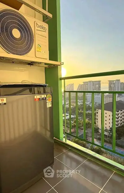 Charming balcony with city view and modern appliances, perfect for urban living.