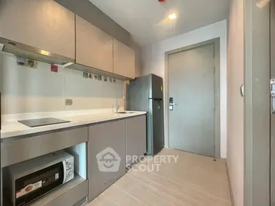Modern kitchen with sleek cabinetry and stainless steel appliances